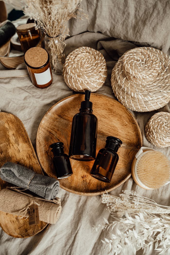 our-experience Eco-friendly skincare display with brown bottles on a rustic setup.